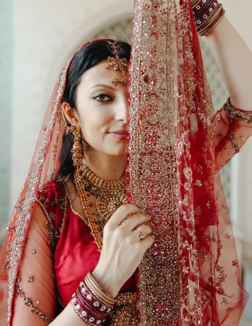 Photo of woman in south asian wedding attire